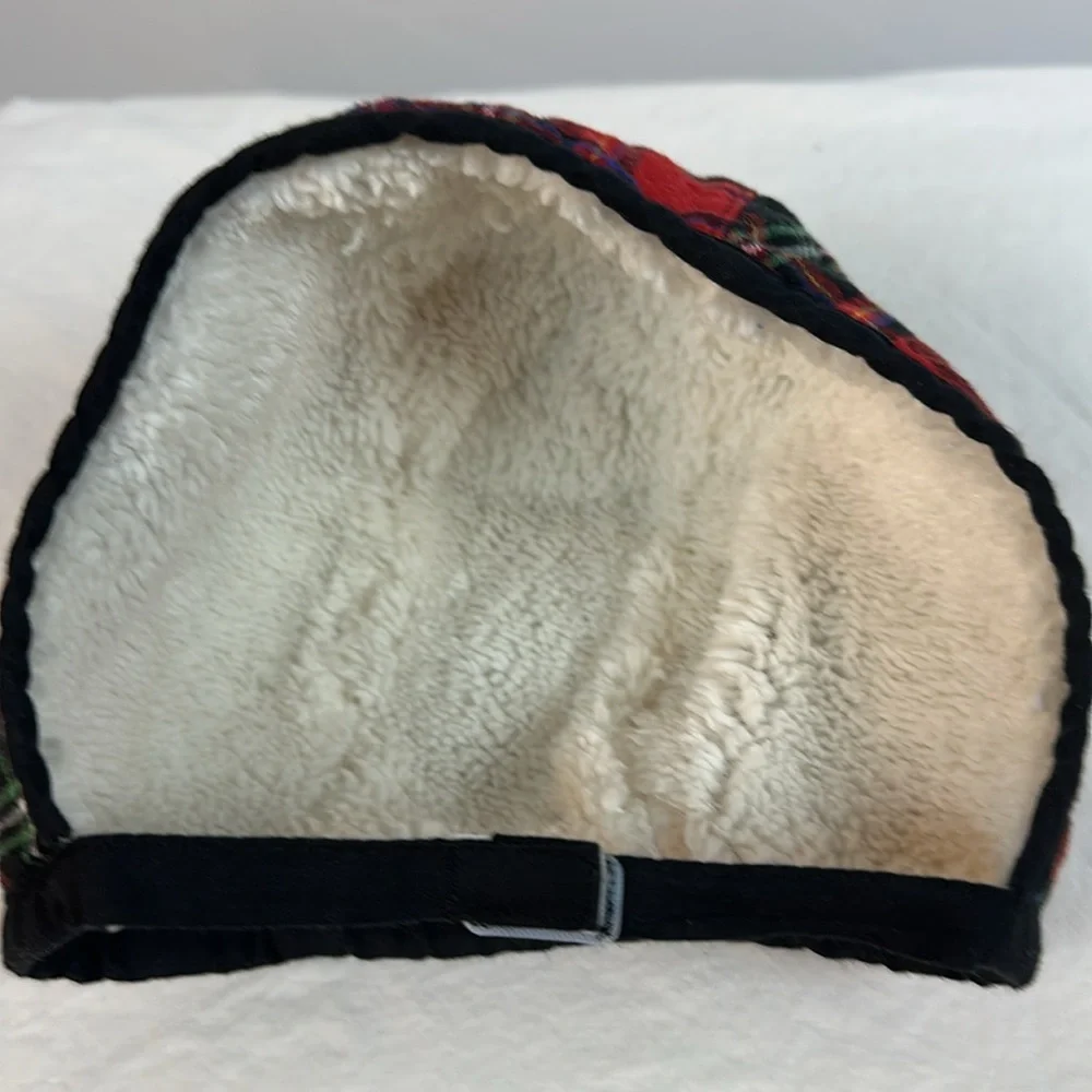 Plaid baby hat with black pom pom